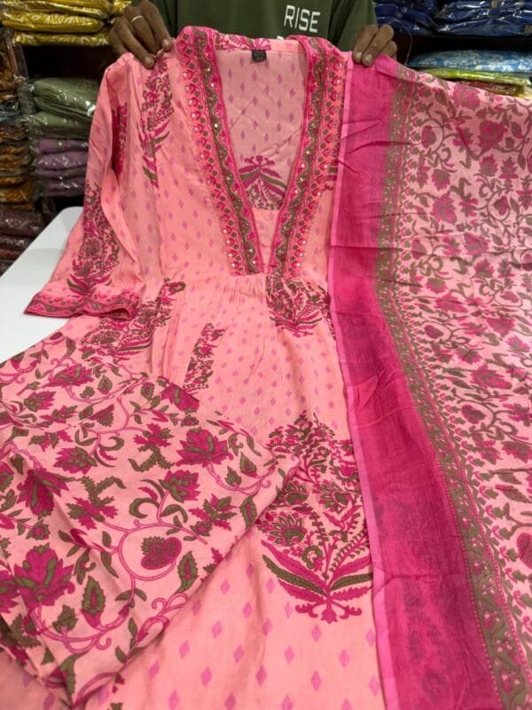 Featuring beautiful embroidery with suqes Heavy  Suit which is beautifully decorated  It is paired with matching pants